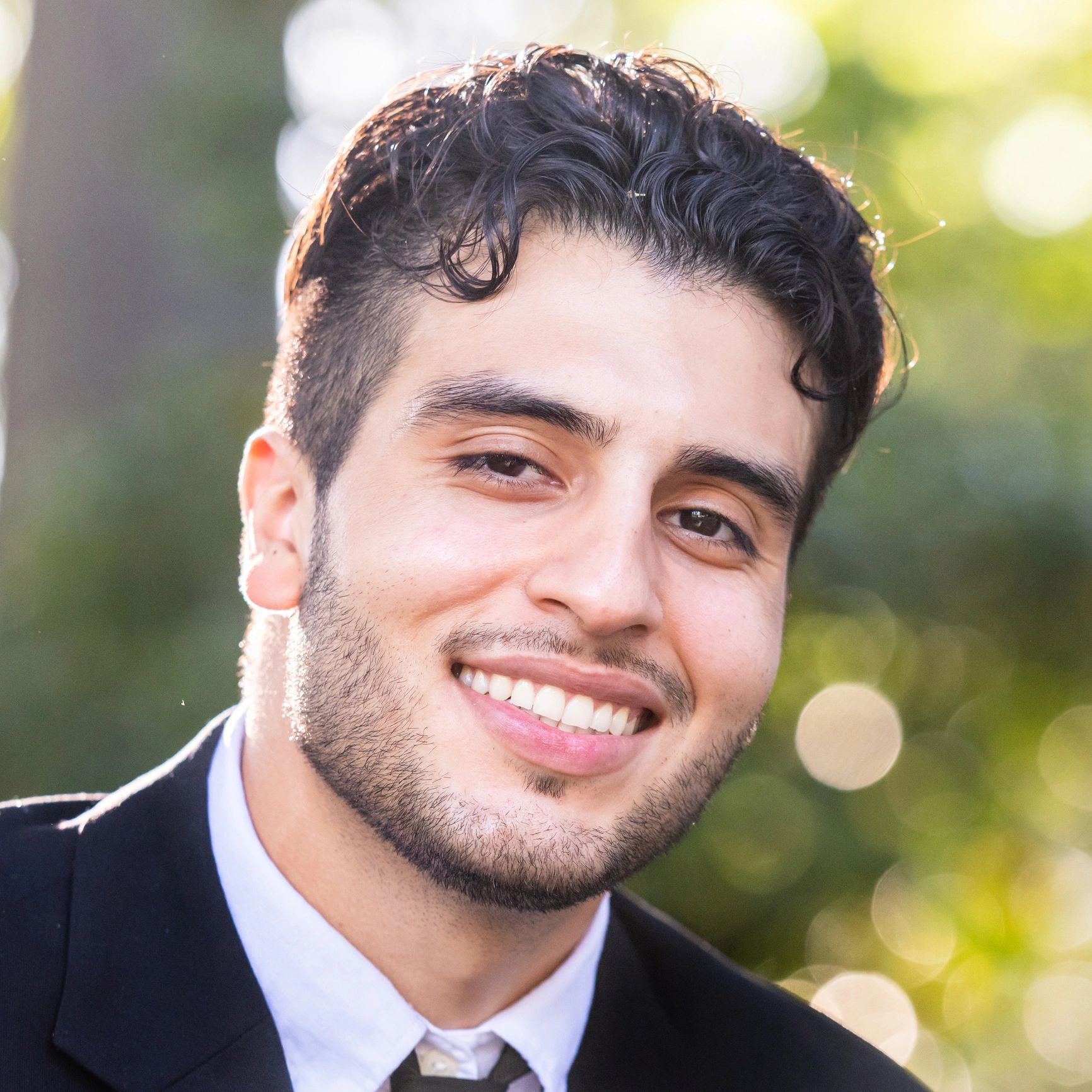 Professional headshot of a client success leader