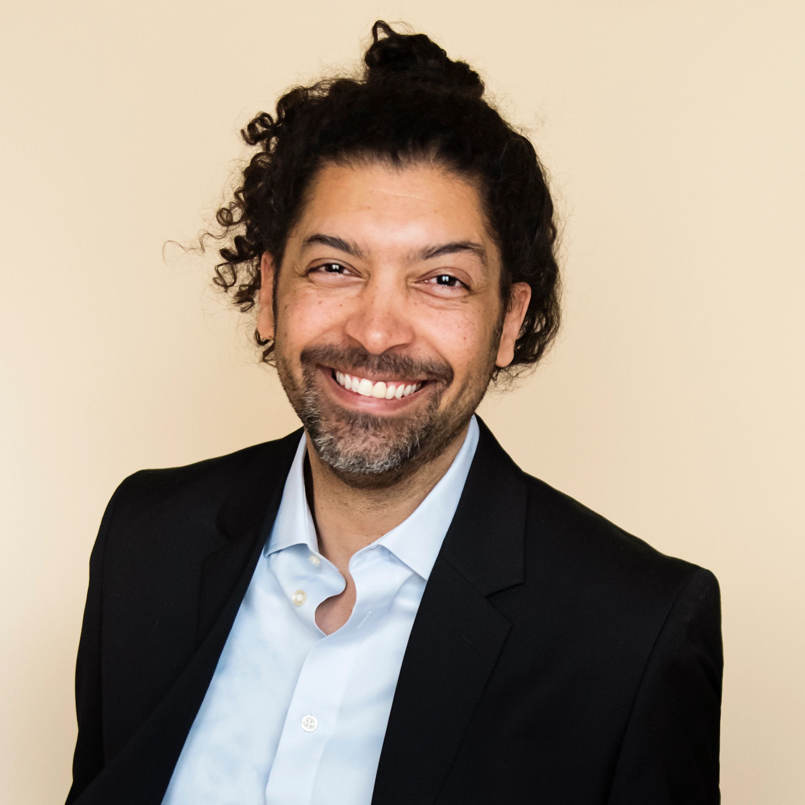 Professional headshot of a contracts leader