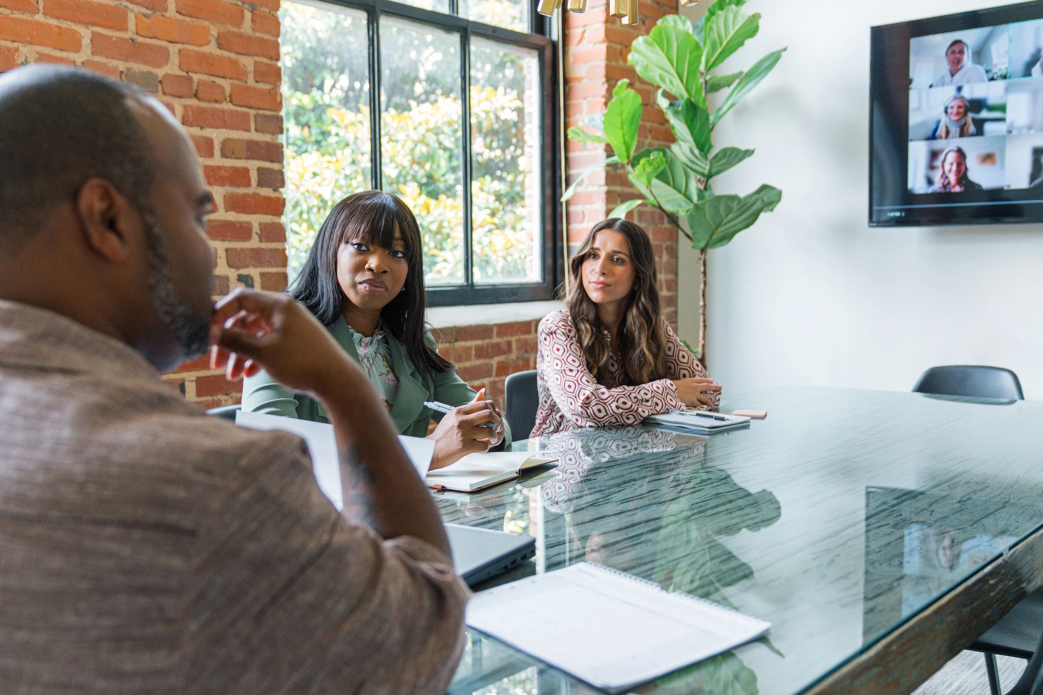 Team collaborating in a modern office to coordinate staffing and operations.